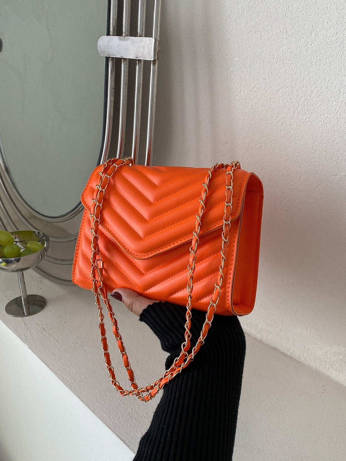 Square bag with chevron snap fastener