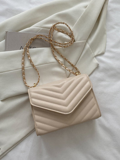 Square bag with chevron snap fastener