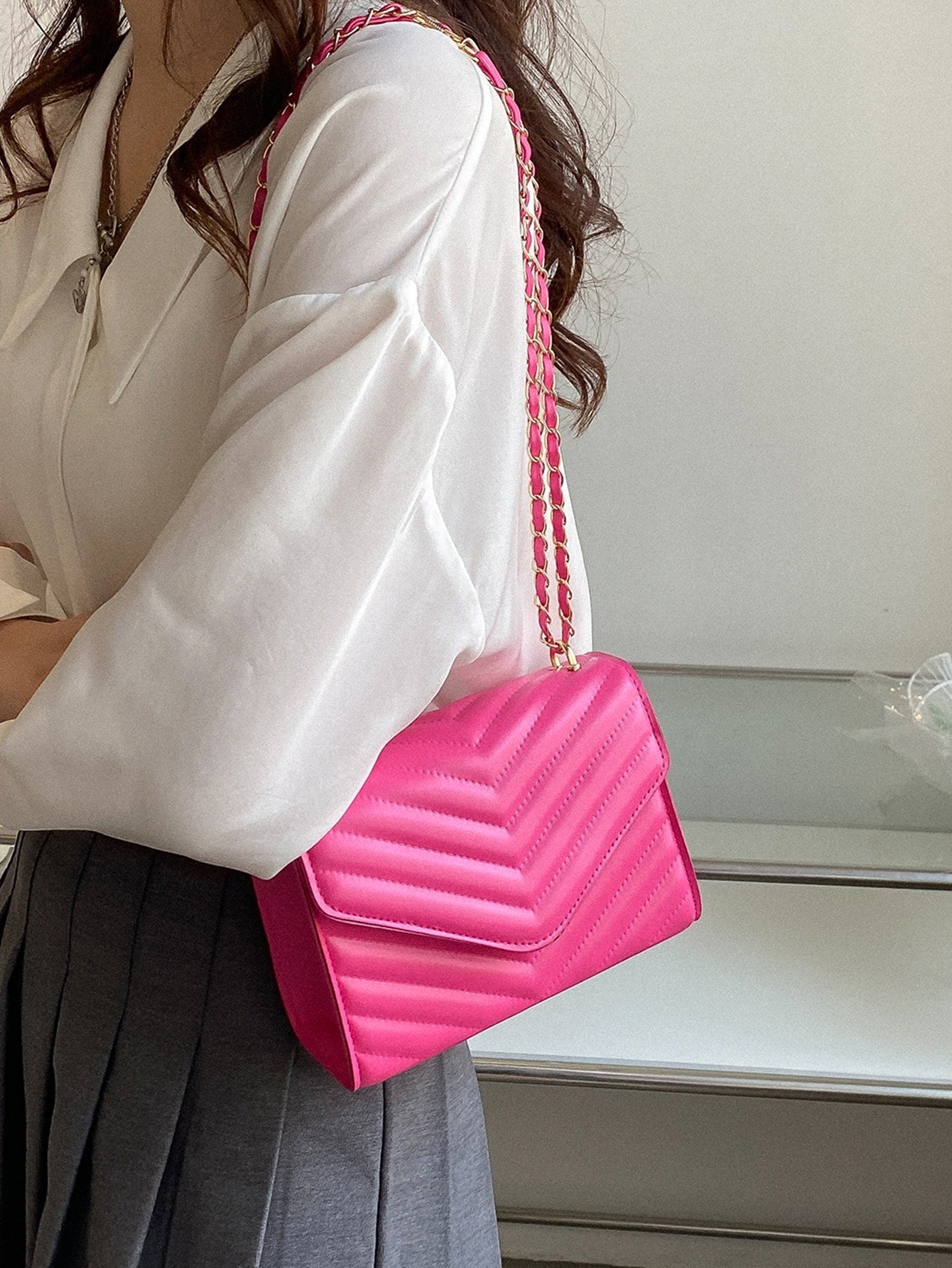 Square bag with chevron snap fastener