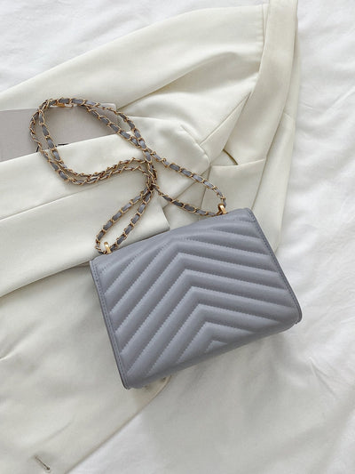 Square bag with chevron snap fastener