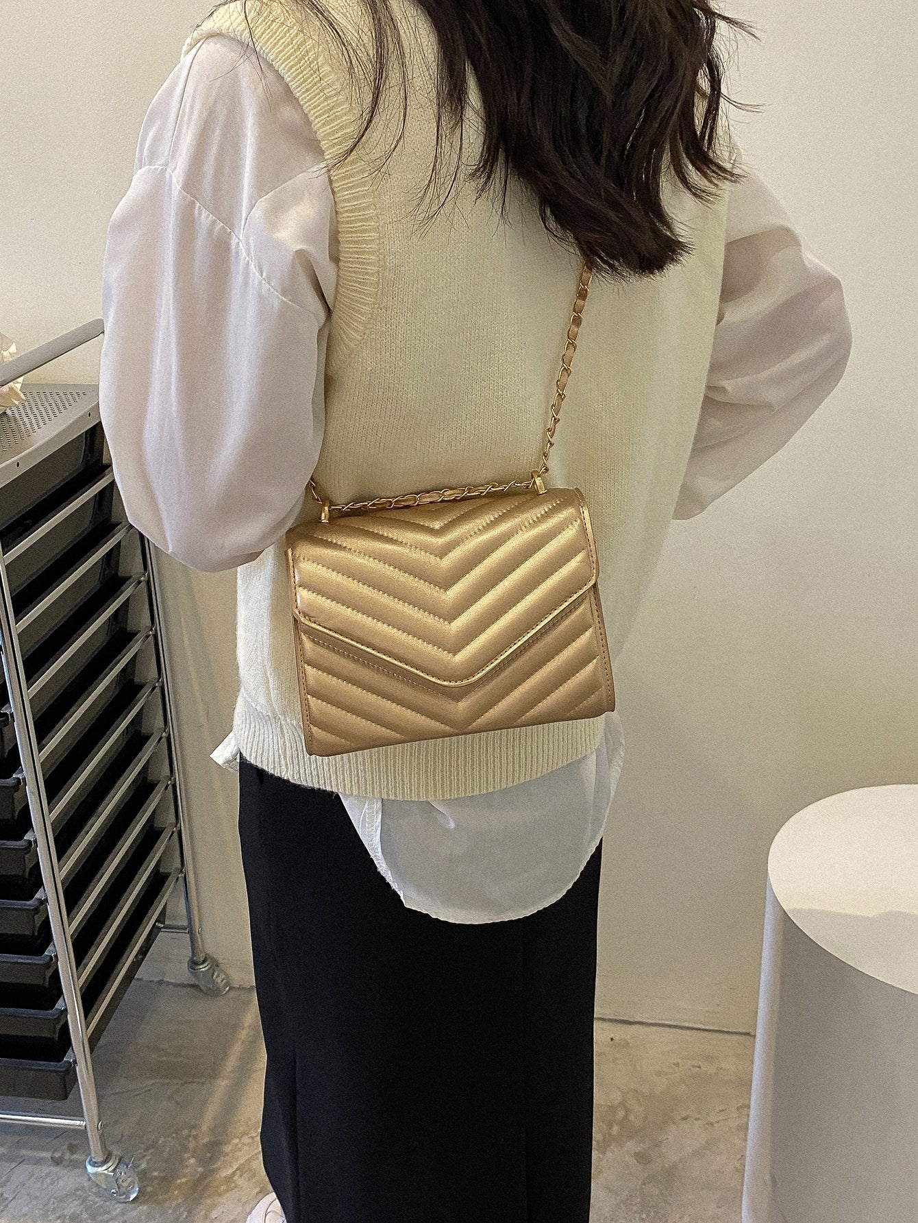 Square bag with chevron snap fastener