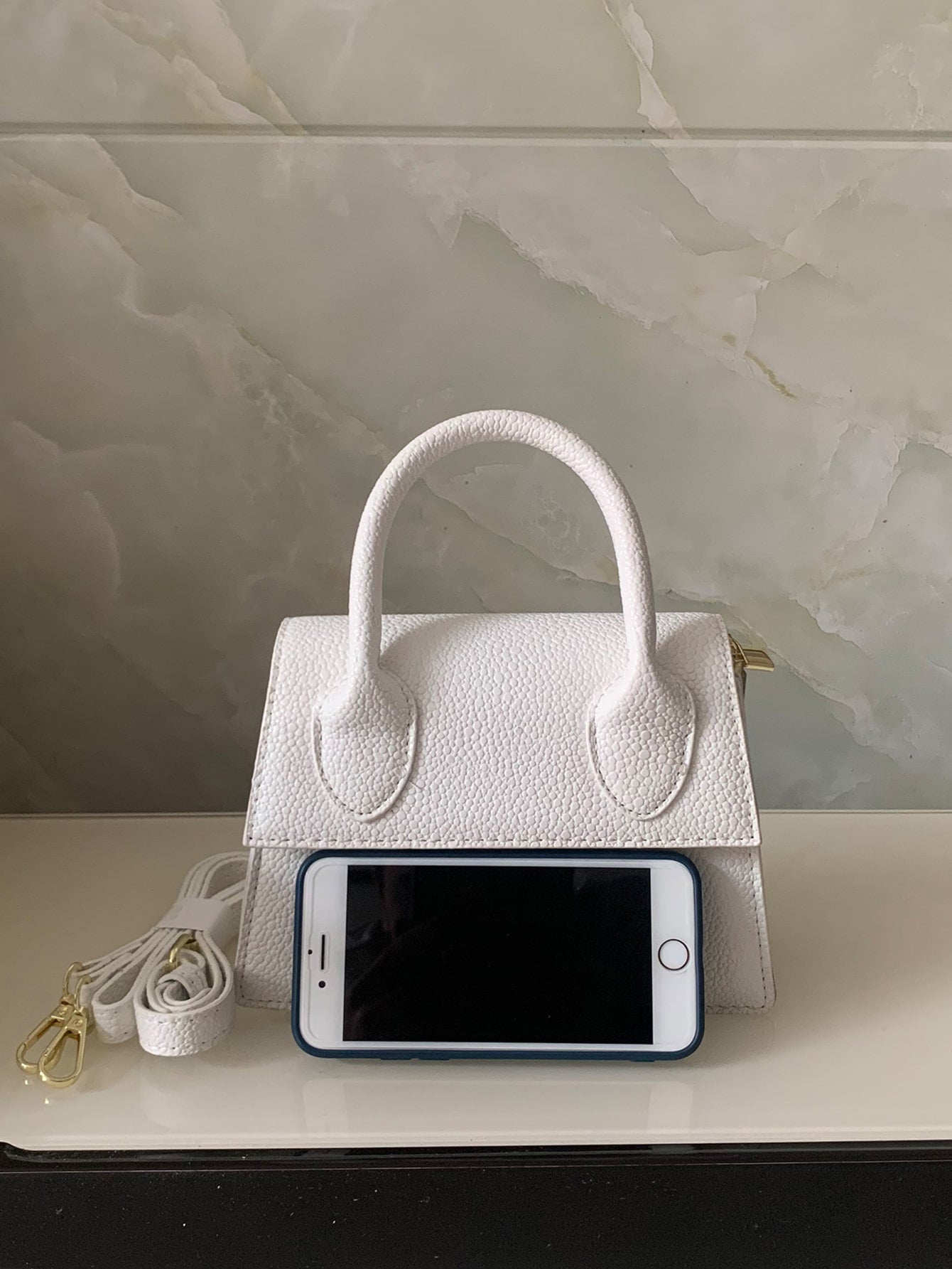 Square bag with pebble embossing, flap