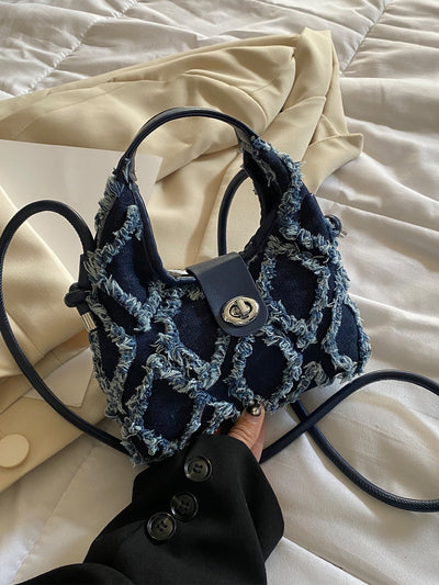 Hobo bag with mini raw hem, twist lock