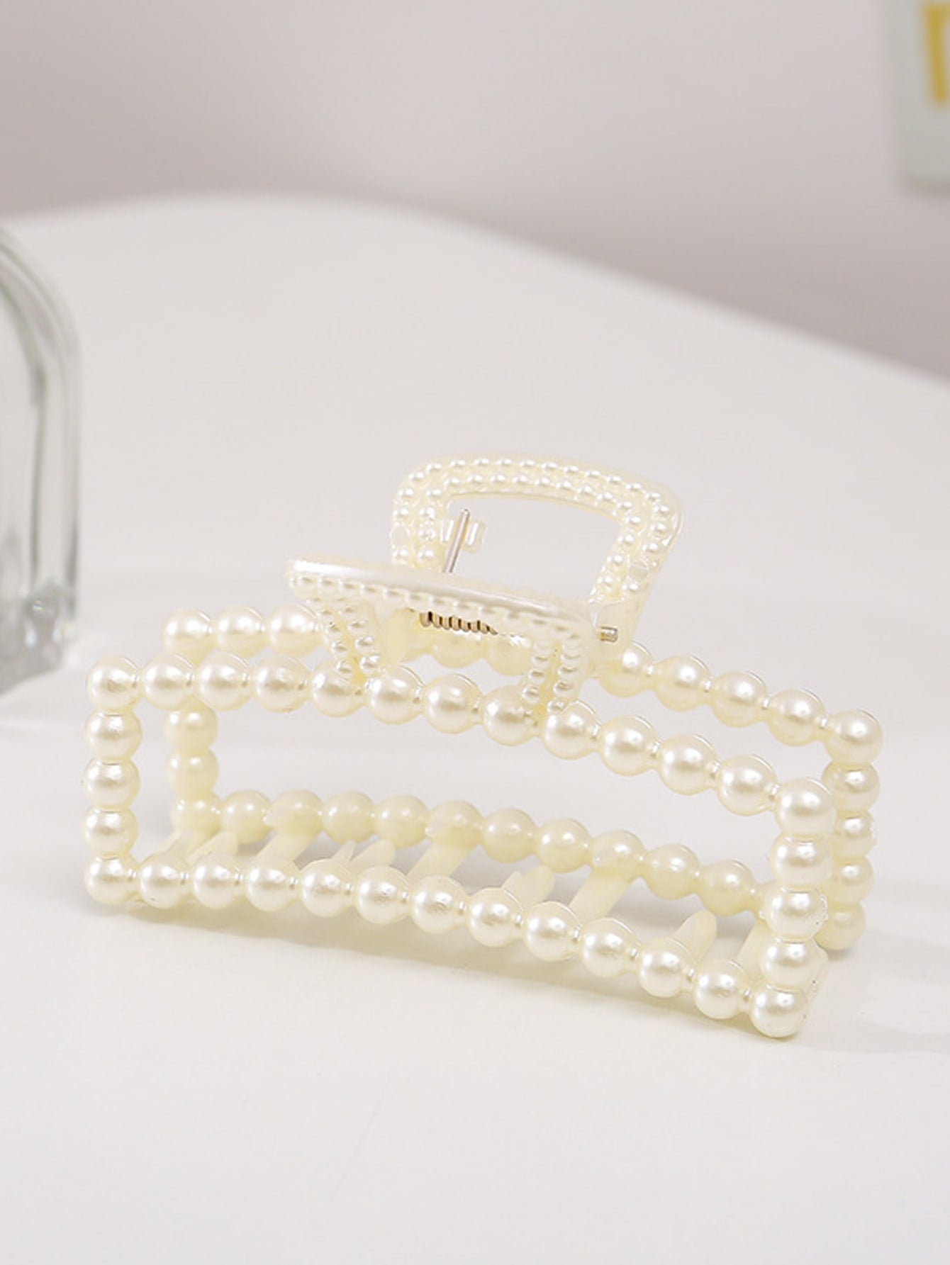 Hair clip with faux pearl decor