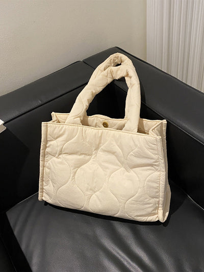 Minimalist shoulder bag with quilted detail