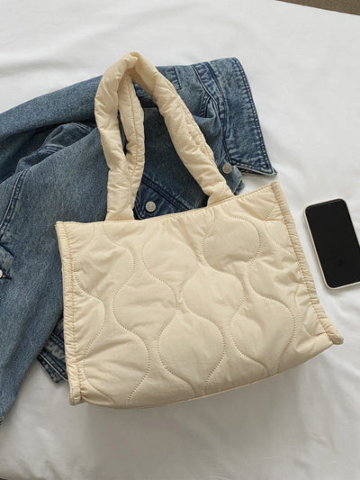 Minimalist shoulder bag with quilted detail