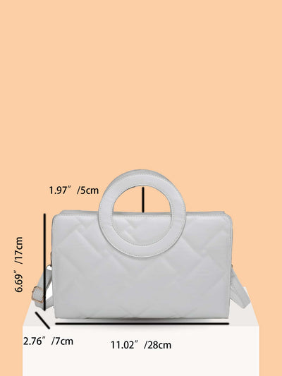 Square bag with metallic crocodile embossing, ring on top